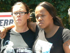 Two mothers: Andrea Irwin's son Tony T. Robinson was fatally shot by a white Madison, Wis. police officer in March. LaToya Howell lost son, Justus Howell, 17, after he was shot by a Zion, Illinois police officer in April.