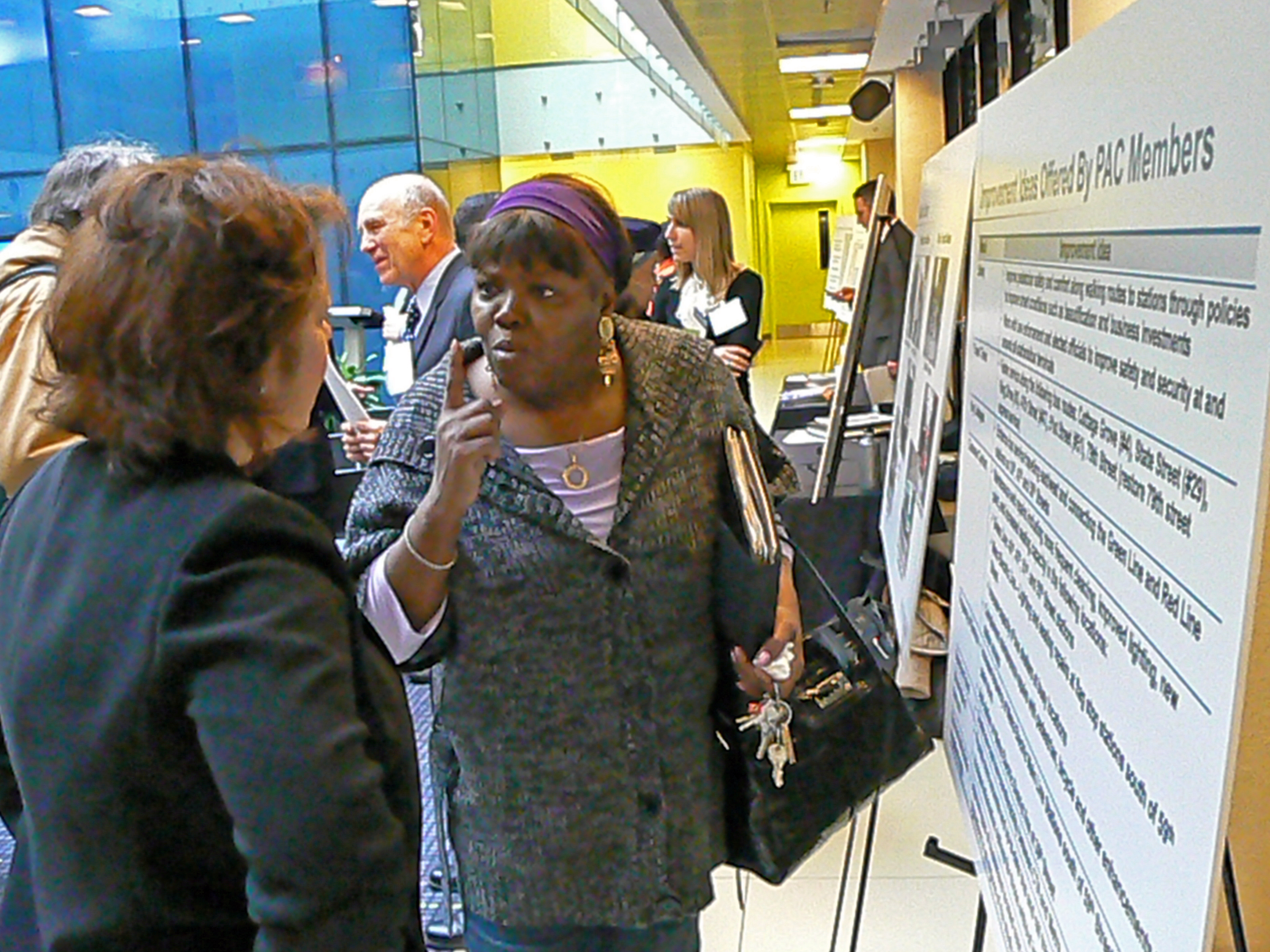 Sandra Bevins, executive director of the 51st Street Business Association, discusses transit improvements ideas, during a meeting hosted by Chicago Department of Transportation.