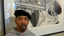 Artist James Pate stands in front of his drawing entitled Kin Killin Kin which is on display at DuSable Museum of African-American History.